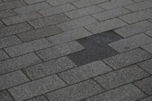 Storm damaged roof shingles in Tifton GA